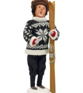 Finished with his run and ready for cocoa, this sweater-clad skier takes a moment to admire the snow-capped mountain he's just conquered. The perfect Byers' Choice figurine for ski- and snowboarding families!