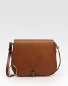 Stunning Italian leather in a classic saddle design with distinct equestrian-inspired logo charm.Crossbody strap, 22 dropFlap closure with leather pullOne inside cellphone pocketLeather lining9½W X 8½H X 2½DMade in Italy