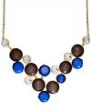A cascade of circular resin beads add a captivating look to this bib necklace from INC International Concepts. Crafted in 12k gold-plated mixed metal. Approximate length: 18 inches + 3-inch extender. Approximate drop: 5 inches.