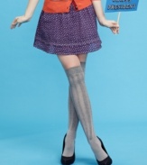 Tiny flowers decorate this a-line mini skirt with adorable style! From Tommy Girl.