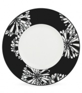 A graphic, kaleidoscope-inspired design featuring the timeless shades of black and white lends any gathering sophistication.