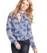 Nab ladylike style in this floral print top from Guess? that flaunts the season's hottest detail – a bow tie!