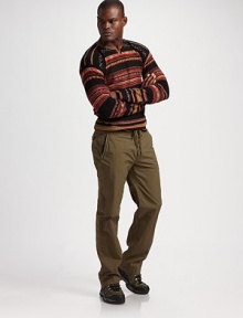 A warm merino wool sweater channels Navajo-inspired style with a rustic blanket stripe pattern and a split neckline. Split neckline 85% wool/11% silk/2% lambs wool/1% cashmere/1% other fibers Hand wash Imported 