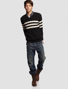 Warm and winter-ready style in a timeless cable-knit design, finished with wide stripes and the softness of silk. V-neckRibbed trim51% wool/31% nylon/16% silk/2% other fibersDry cleanImported