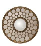 More than just a mirror the Altia by Uttermost is a mosaic art piece made of a central convex mirror surrounded by smaller mirrors arranged in a graduated circle design. With its antique gold leaf finish, it will bring an unmistakable drama and glamour to wherever it is displayed.