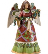Ready to hang a string of festive garland, this folk-inspired angel will quickly become a centerpiece in your home. A geometric print dress, flourished wings and a wash of Christmas color add a timeless warmth.