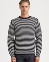 A wardrobe essential for stylish weekends, this crewneck style expresses a nautical feel with signature stripes and button detail at the shoulder.CrewneckWoolDry cleanImported