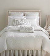 The Shimmer king sham from Martha Stewart Collection features an attractive blossom jacquard pattern over a silvery ombré ground. Soft piping completes this elegant design.