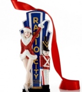 Kick off a spectacular Christmas season with the Radio City Rockette ornament. Posing in a sparkling red uniform with a matching toy soldier, this word-famous Christmas figure is an absolute show-stopper at all of your holiday gatherings.