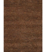 Bold colors... creatively combined by Couristan. Created by blending different thicknesses of soft wool yarn, this blissfully plush area rug features an ultra-thick pile that's rich in both texture and tone.