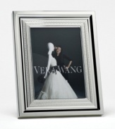 A sensuous blend of vintage-inspired frills create beautiful depth in this frame. In high-luster silverplate, this elegant home accent is fit for framing all your finest memories.