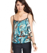 From the soft tiers that flow away from the body to the print that evokes ocean life, gorgeous details are in full supply on this must-have top from Baby Phat!