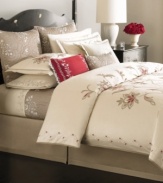 Classically elegant, the Dreamtime Floral comforter from Martha Stewart Collection boasts vintage-inspired floral embroidery at center and along the border. Features a soft, silk-like texture.