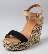 Black, tan and detailed all over, these VINCE CAMUTO wedges have a lot to love. Stitching details at the ankle strap lend a unique touch, while a braided wedge infused with metallic shimmer makes the shoe all-out covetable.