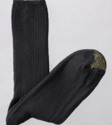 A thick, luxurious casual sock in combed cotton. Ribbed texture all over. Three pairs to a pack.