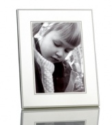 Delicately beaded edges add to the resplendent beauty of this Silver Bead picture frame from Martha Stewart Collection. Simply timeless in brilliant silver plate, it brings new attention to the past. With velvet backing.