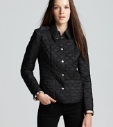 Burberry Brit takes the classic approach to chic, everyday outerwear in this flattering quilted jacket. Pair with all your favorite winter wares.