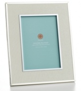 Wrap up major milestones in your life with this elegant frame. Ivory ribbon and silver-plated inner and outer rims frame the moments you never want to forget.