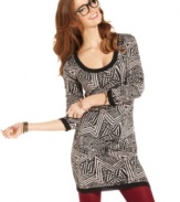 Add some pop to your look with this fun geometric print sweater dress from Material Girl!