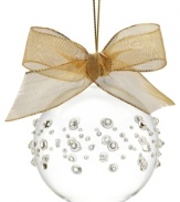 Let it shine! Boasting beautiful clear glass with accents that light up, this ball ornament from Lenox offers a beautiful addition to your tree. With gold bow and hanging thread.