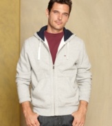 Check under the hood. This hoodie from Tommy Hilfiger is ready for your casual collection.