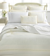 Relax in tranquility. This ivory satin quilt accentuates your L'erba Serene bed and adds an extra layer of comfort. Embellished with an ornate, textured hem.