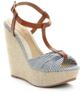 Reach new style milestones in Ciao Bella's Talita linen wedge sandals. A playful smattering of stripes and 5 wedge heels create a chic silhouette.