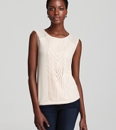 Exude easy femininity in a BCBGMAXAZRIA top with pleating at the bodice for a touch of charm this season.