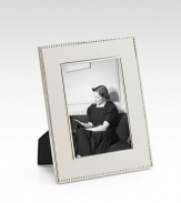 A stunning display for a treasured photograph, designed in heirloom-quality sterling silver with tiny-bead trim. Accommodates a 4 X 6 photograph Overall, 8¼ X 10 Sterling silver Made in USA 