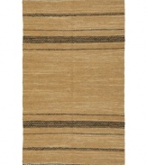 Olé! Spice up your decor with the gorgeously festive style of the Matador rug from St. Croix. Durable leather strips in elegant tan and ochre hues are meticulously hand woven with fine cotton strands, resulting in a beautiful, rustic texture and natural braided pattern that accents even the most eclectic decor.