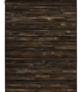 Western chic. Invite sumptuous style into your home with the one-of-a-kind Prairie rug from Calvin Klein. Tonal bars of rich cowhide are hand-tufted in an alternating pattern to create a stunning, mosaic-like appearance and a divinely textured feel.