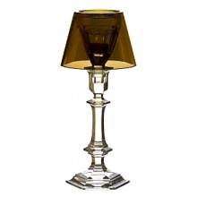 Our Fire is a dramatic candleholder in three parts: Versailles candleholder; a reproduction of the Harcourt glass which serves as a receptacle for the candle; and metallized crystal lampshade.