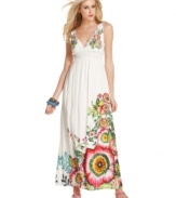 A burst of bold florals make a bright statement on this Desigual maxi dress, perfect for summer style!