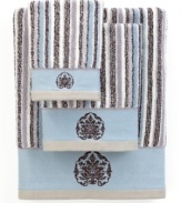 Sweet serenity. Offering a romantic and elegant composition for your bath space, this Aquarelle Embroidery washcloth features beautiful stripes in soft blue hues. Embellished with subtle embroidery along the hem.