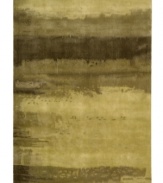 Abstract and dramatic, this handcrafted wool rug features a rich spectrum of shades from light earth tones to deep gold. The ethereal coloration pattern is reminiscent of a desert landscape set in vibrant watercolors. An exclusive luster-wash finish gives the rug a beautiful, subtle finish.