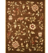 An intricate display of cascading florals creates this purely elegant Lyndhurst area rug from Safavieh. Crafted in Turkey of soft polypropylene, this rug radiates timeless allure with the added convenience of easy-care construction. (Clearance)