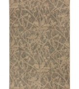 An intricate depiction of wildflower silhouettes are placed over a modern abstract motif in the Carmel Salinas area rug from Karastan, offering a soft yet fashionable accent for any room. Thick and resilient underfoot, this plush piece is woven from 2-ply nylon pile, ensuring easy care and long-lasting wear.