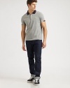 A casual favorite, shaped in soft, cotton with contrast collar and chest logo detail for a polished finish.Three-button placketCottonMachine washImported