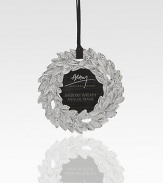 A favorite photograph will lend a personal touch to this elegant silver-plated frame ornament.HandmadeSilverplate4 diam.Imported
