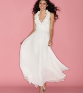 A high, ruffled collar ups the chic factor on this floor-sweeping halter neck gown from B Darlin!