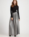 A jet black waistband leads to edgy zipper-teeth giving this platinum, gathered design, maxed-out style. Zipper teeth at bottom of waistbandExposed back zipper with charmFully linedAbout 42 long52% polyester/48% acrylicDry cleanImported Model shown is 5'10(177cm) wearing US size 4. 