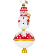 Cute as a button, this Littlest Snowman ornament is totally whimsical and styled for the season with rosy cheeks, polka dot scarf and red hat. Embellished with frosty sparkles for a touch of magic. From Christopher Radko.