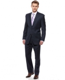 Keeps your wardrobe on the cutting edge with this slim-fit navy suit from Calvin Klein. Keeps your wardrobe on the cutting edge with this slim-fit navy suit from Calvin Klein.