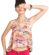 Get your summer color fix! Splatters of vivid hues paint the prettiest picture on this asymmetrical blouse from Material Girl.
