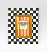 Display your treasured moments in this opulent, hand-painted frame with gilt inner molding.Hand-painted checks on enameled steelGlassAccommodates a 4 X 6 photographOverall, 9 X 11Linen-covered easel and backImported