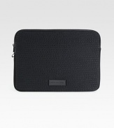 A hint of padding is all the protection your laptop will need inside this neoprene case finished with debossed logo detail and a signature patch.Zip closureNeoprene13¾W x 10H x ¾DImported
