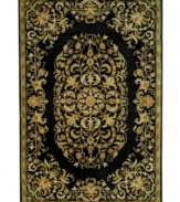 With rich, luscious detailing and a vibrant feel, Safavieh's Heritage collection brings life to any space. Hand-tufted of pure wool, the black rug features scrolling vines and medallion shapes merging together in a joyous pattern, adding eclectic elegance to your home. (Clearance)