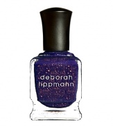 A step away from Deborah Lippmann's signature glitter, this 3D Holographic formula has an edgier feel. While it was in the development process, she played with a ton of hues adding different-sized flecks of glitter to create a unique layered, multi-faceted 3-D effect that's super modern but still completely wearable. After much mixing, she is now finally introducing two new shades, RAY OF LIGHT, an electric indigo, and SWEET DREAMS, a candied pink. Wear these shades alone, or paired with any of my creme lacquers for an innovative look.