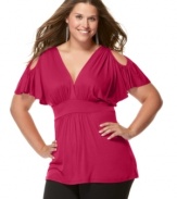 The cold shoulder has never been so hot: Soprano's beautifully-draped plus size top features a sexy peek of shoulder and a flattering empire-waist silhouette.