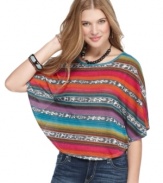Add a rich tribal print to your trove of tops with this poncho style from Living Doll!
